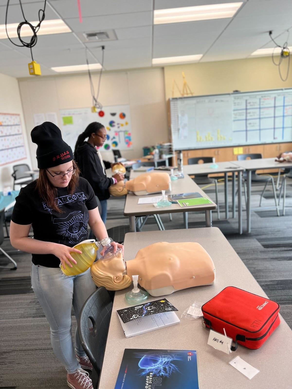 Students learn CPR.