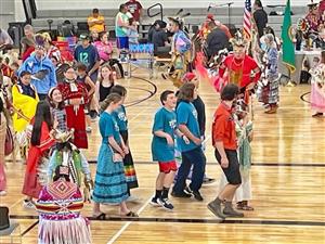 Flett Students and dancers at Powwow