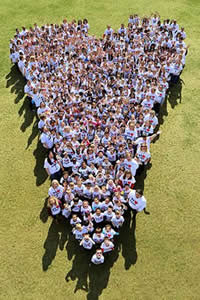 wide shot of students in heart shape