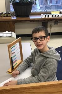 boy with abacus